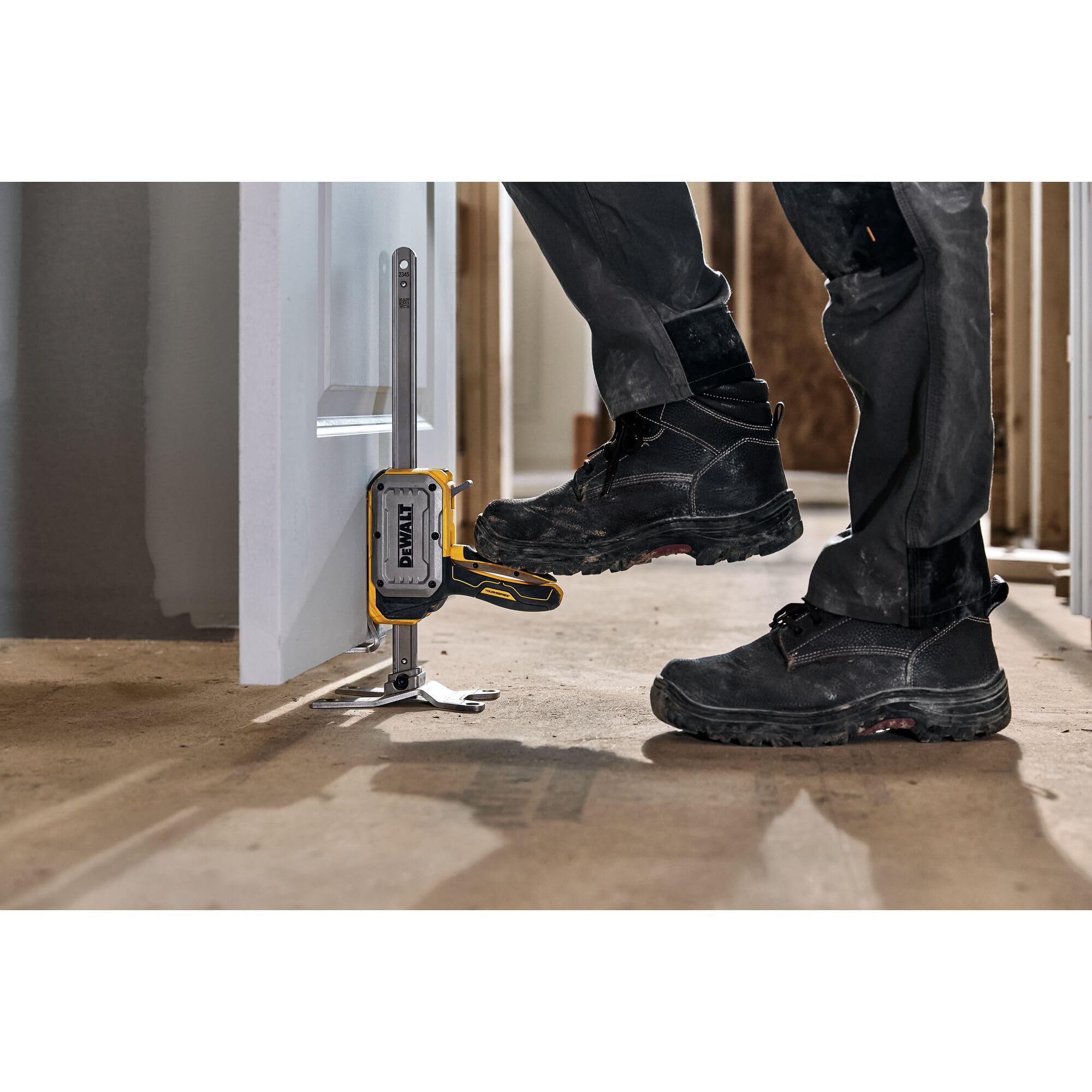 DEWALT jack next to toolbox showing compact size for transport and storage