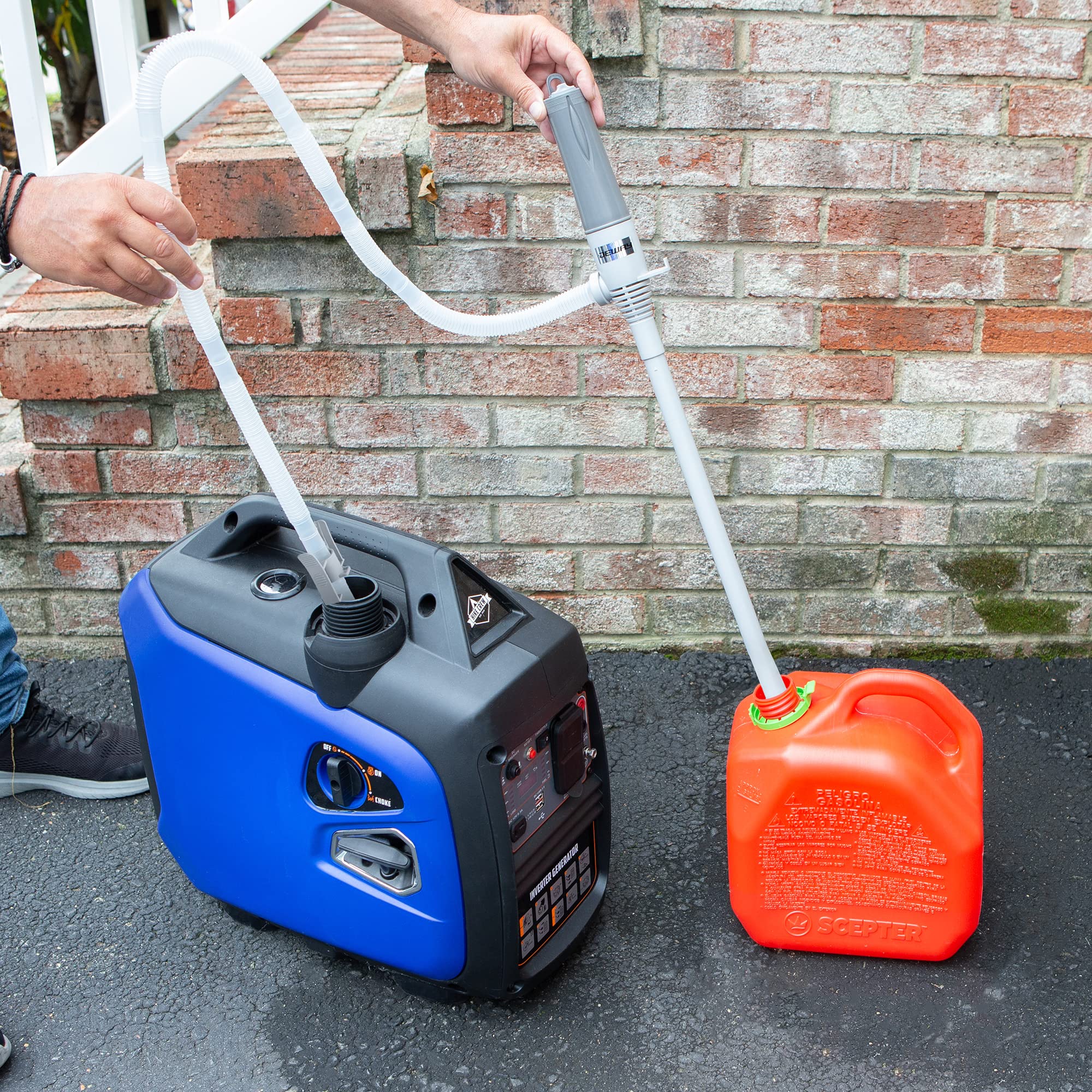 DEWAY WAYPUMP07 hose inserted into a tall jug showing full-depth suction capability
