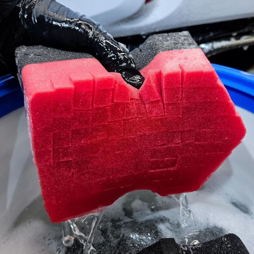 diy detail sponge washing a car panel illustrating safe clear coat cleaning