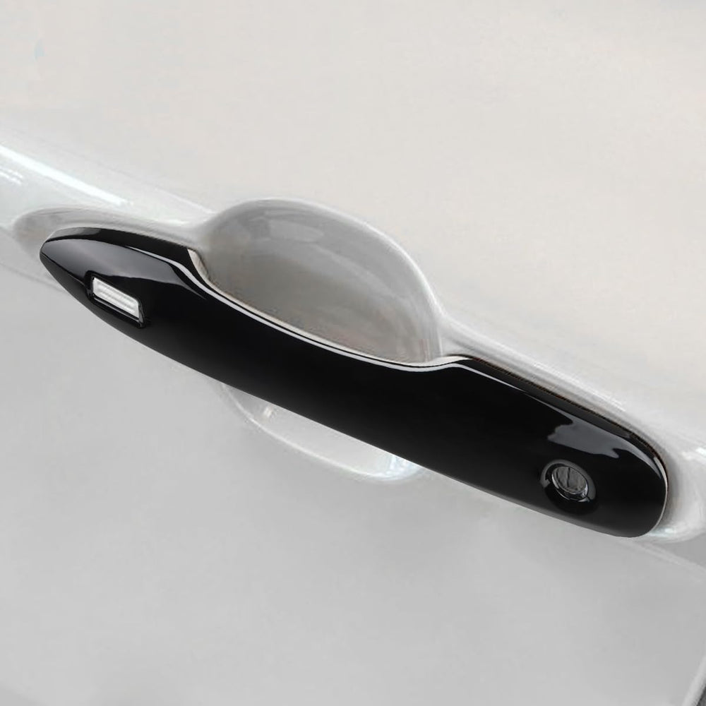 DLOVEG handle cover next to key fob for scale showing compact protective trim