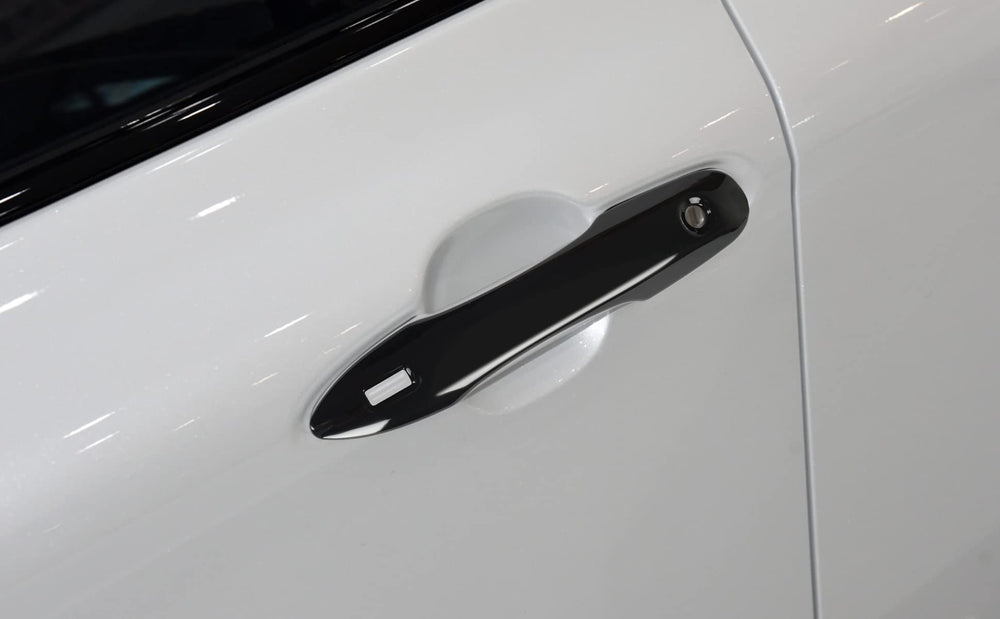 DLOVEG rear handle in use illustrating improved grip and protection from scratches