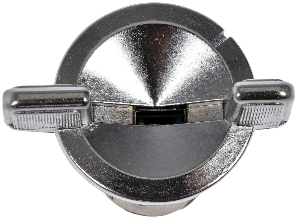 Dorman ignition lock cylinder beside a ruler showing scale for correct fitment