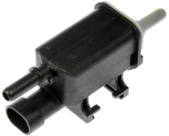 Dorman purge valve front view showing plug and hose ports for reliable replacement