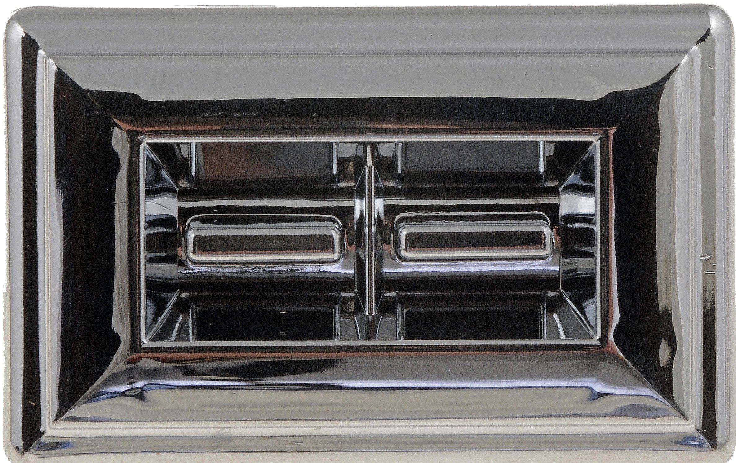 Dorman switch installed in door panel demonstrating restored appearance and function