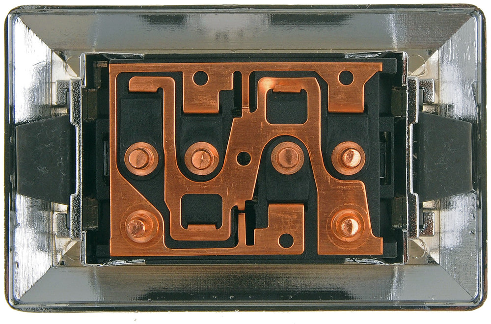 Dorman switch held in hand for scale showing compact size and simple DIY replacement