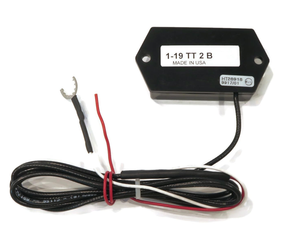 DTI Tiny Tach TT2B beside a coin for scale showing compact size and easy mounting