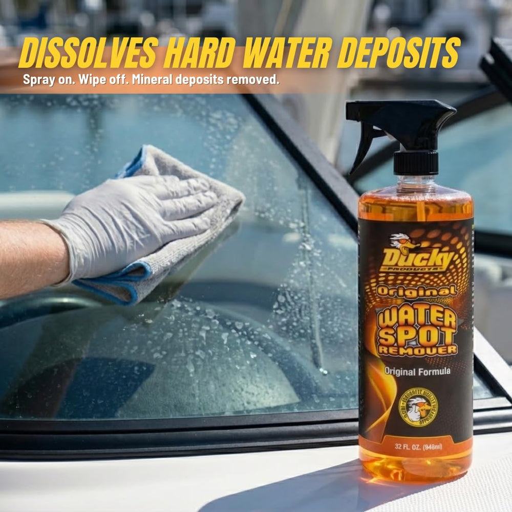 DUCKY PRODUCTS spray applied to boat transom removing mineral deposits
