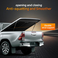Dukuge strut installed on a truck tonneau cover demonstrating stable support and safe opening