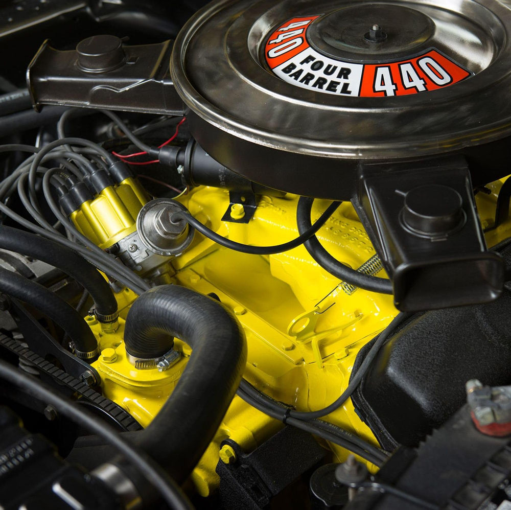 Engine bay lifestyle shot with Dupli-Color Alpine Green highlighting restored appearance and protection