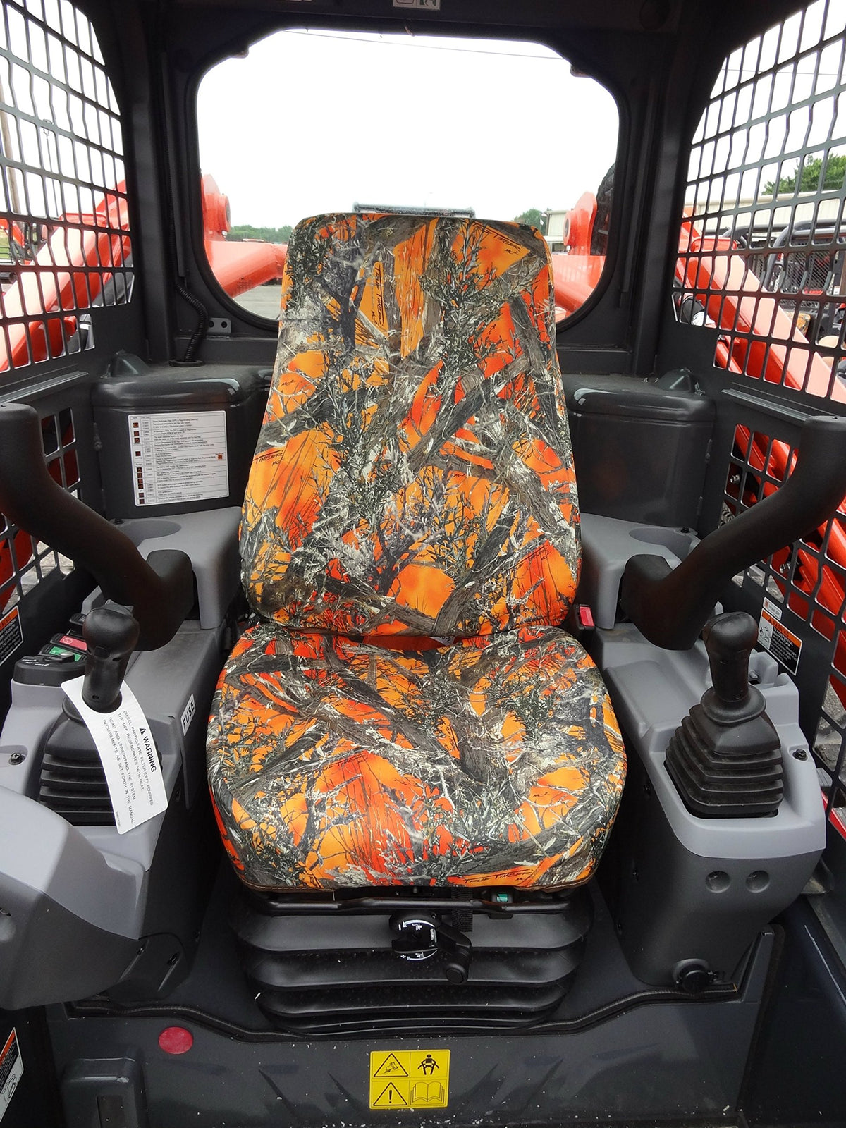 Durafit Seat Covers KU24 MC2 front view on Kubota seat shows orange camo protection and durability