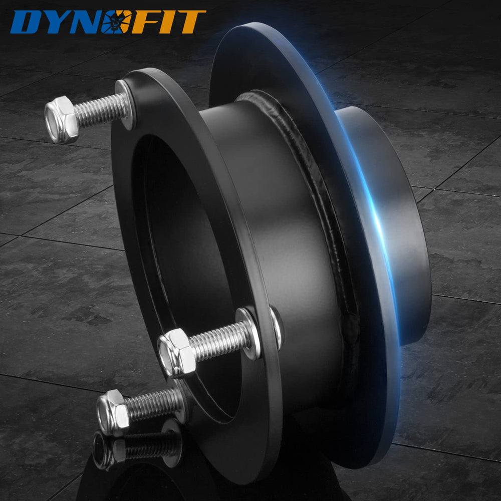 dynofit kit next to ruler for scale showing actual 2.5 inch lift dimensions