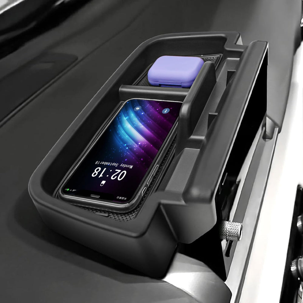 EDBETOS organizer next to hand to show compact scale and ergonomic depth
