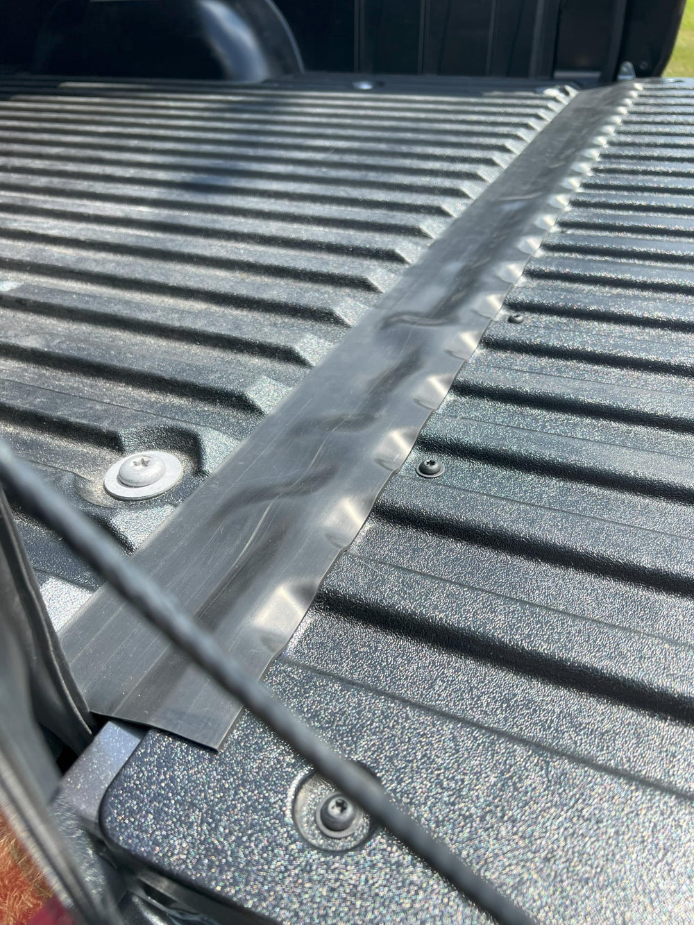 ESI ROK BLOCK installed with a tonneau cover reducing bed contamination