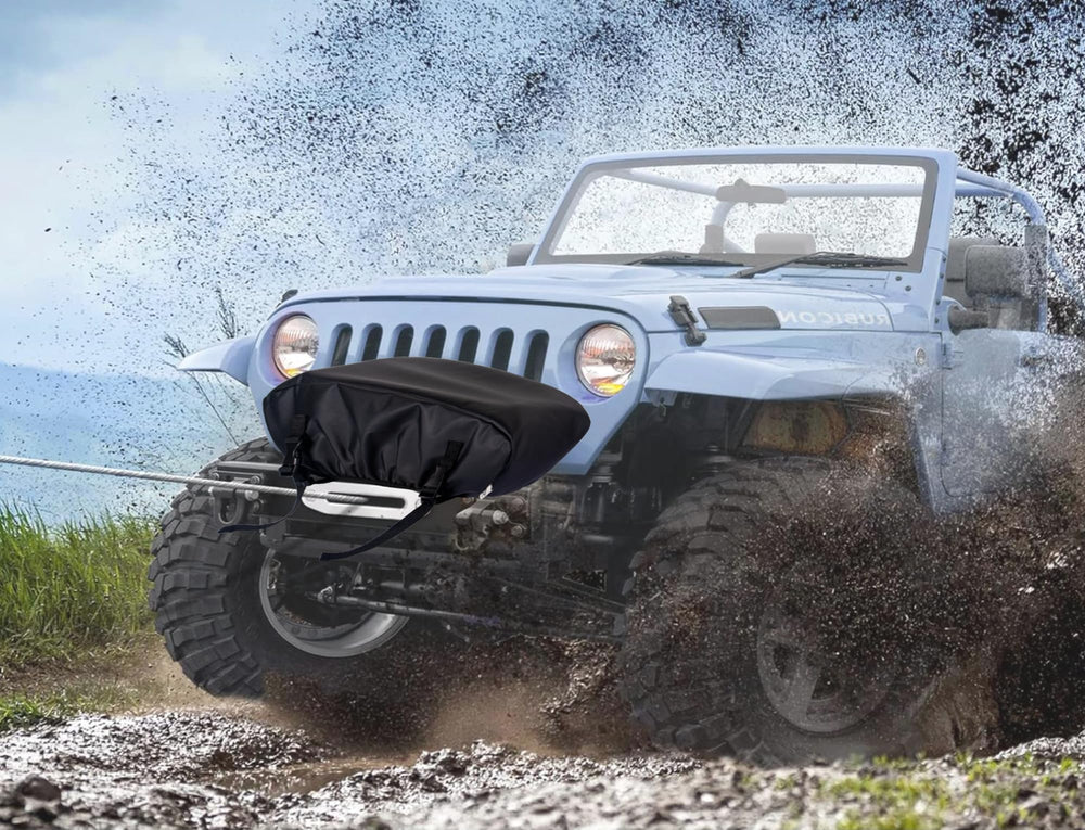 Eudora winch cover on an ATV in a field illustrating weather protection during outdoor storage