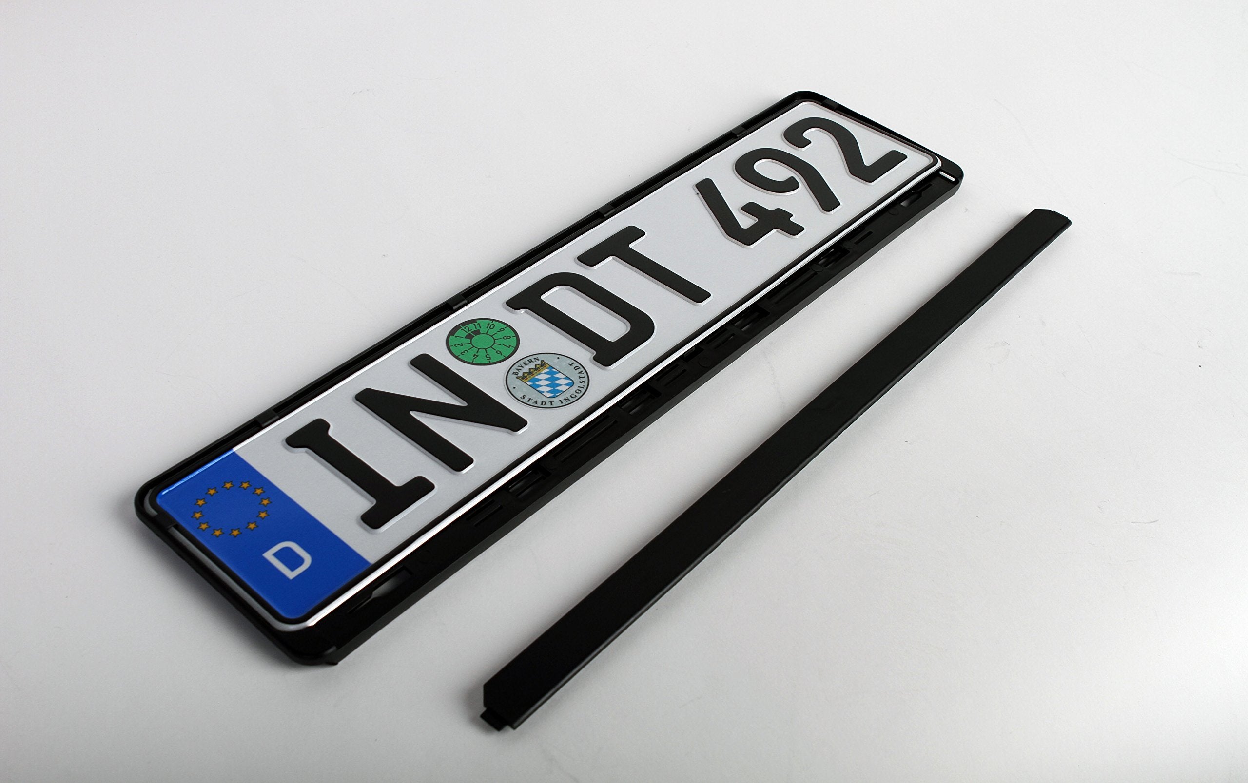 European License Plates with tape measure showing exact 520mm by 110mm fit