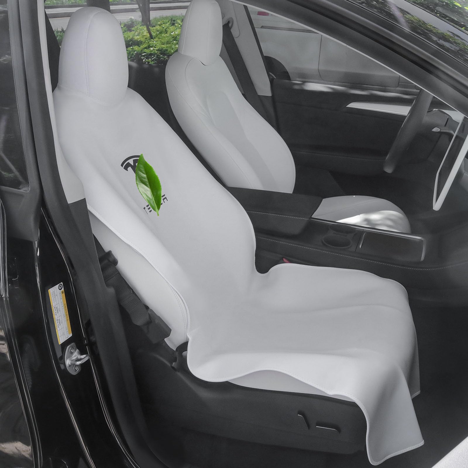 EVMODS full front seat protector fitted on Tesla Model Y preventing spills