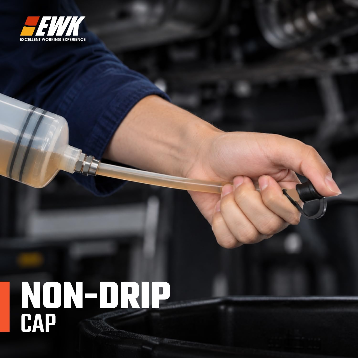 EWK in use on a transmission filler neck for precise, mess-free fluid service