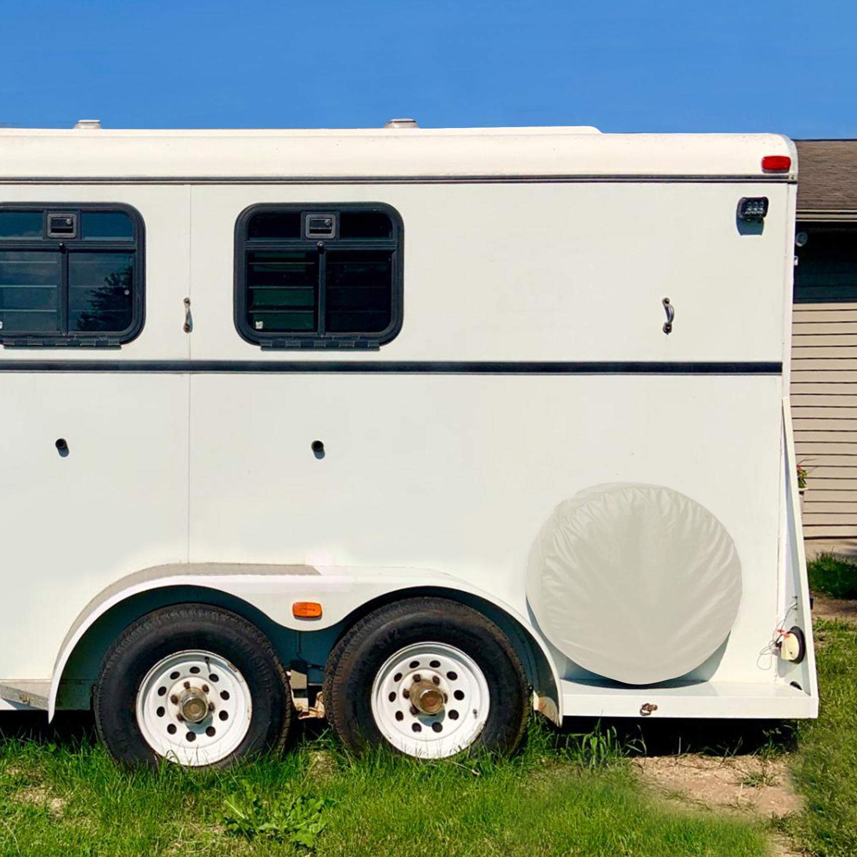 Explore Land mounted on an RV spare tire showing fit and finish
