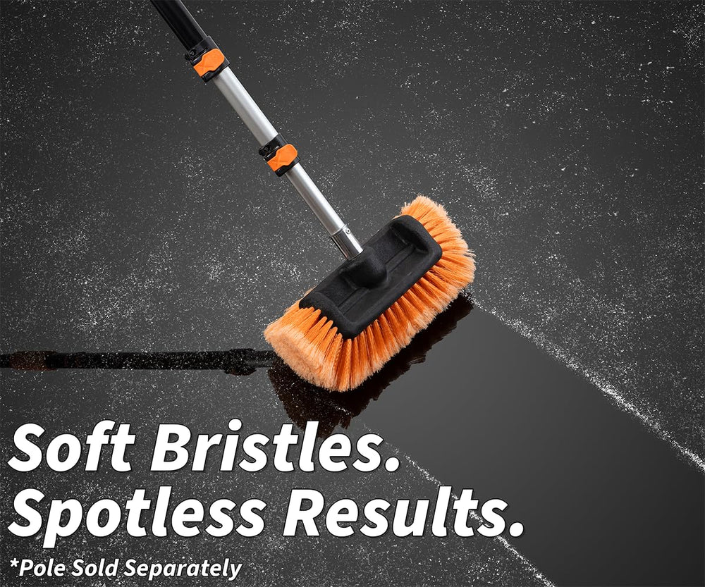 EXTEND-A-REACH brush next to a hand to show scale and easy maneuverability