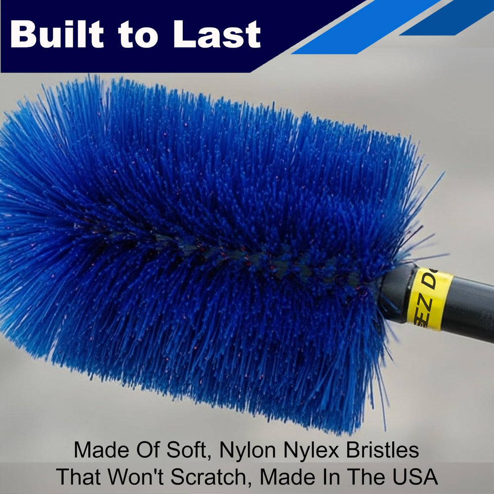 EZ Detail Go Brush next to ruler showing compact size and portability