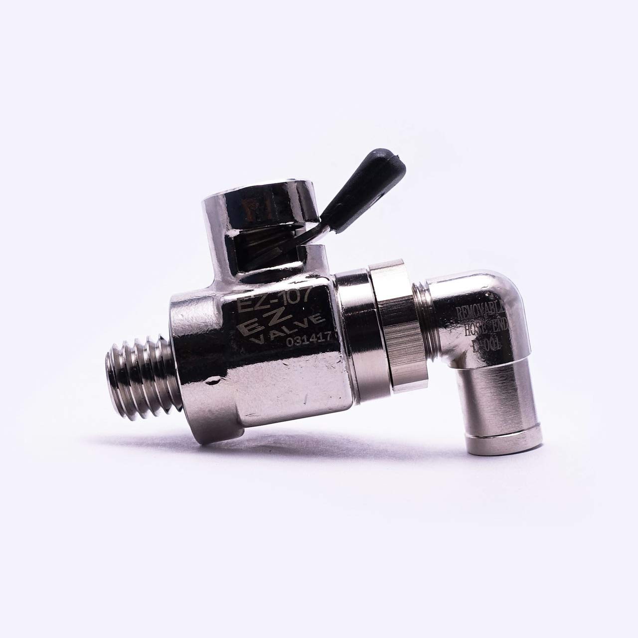 EZ Oil Drain Valve installed under vehicle directing oil to catch pan for cleaner work