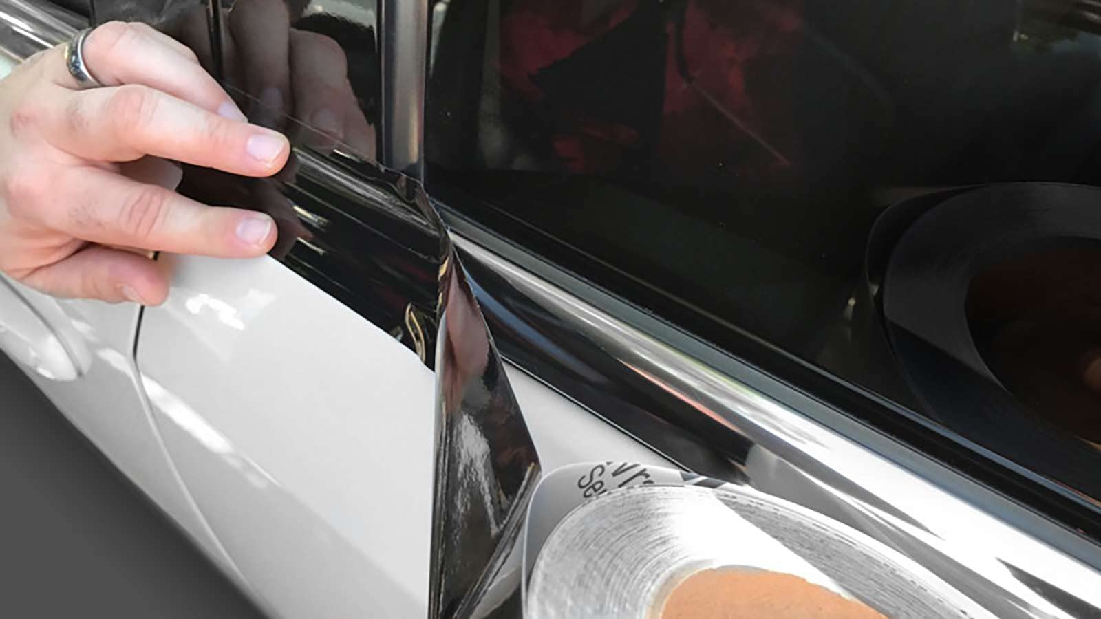 EZAUTO WRAP roll beside ruler showing 2 inch width and 25 foot length