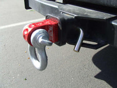 Factor 55 Hitchlink next to a ruler showing compact 6.6-inch size for space-saving