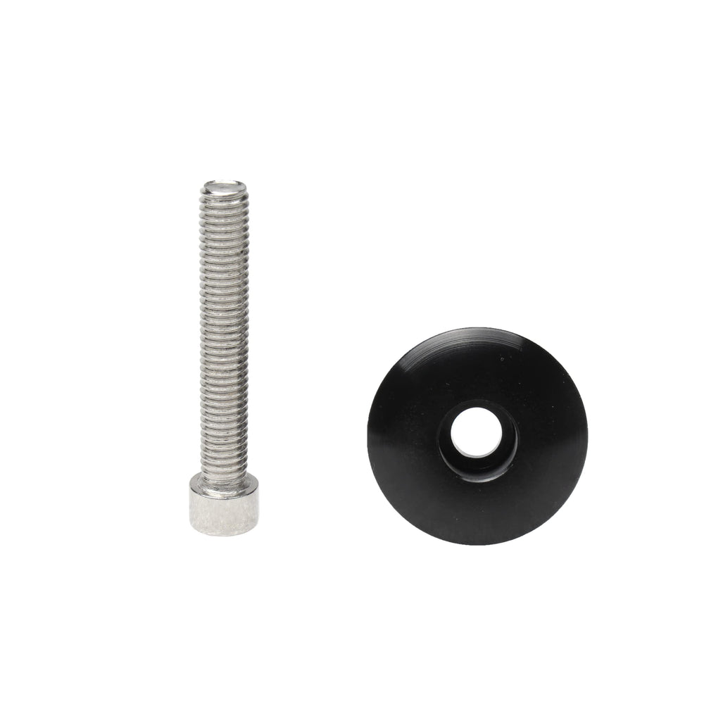 FENRIR adapter next to ruler for scale showing compactness benefit
