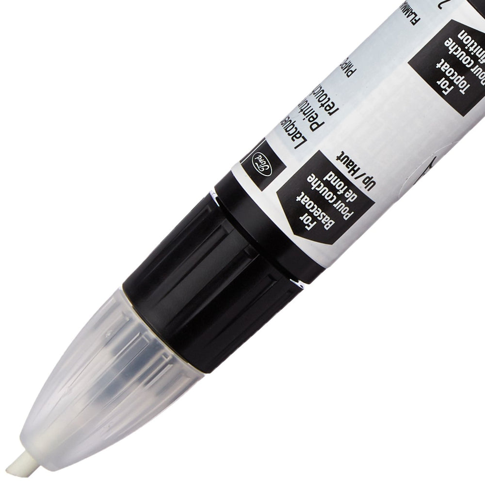 Ford touch-up paint used in a car repair setting for quick blemish concealment