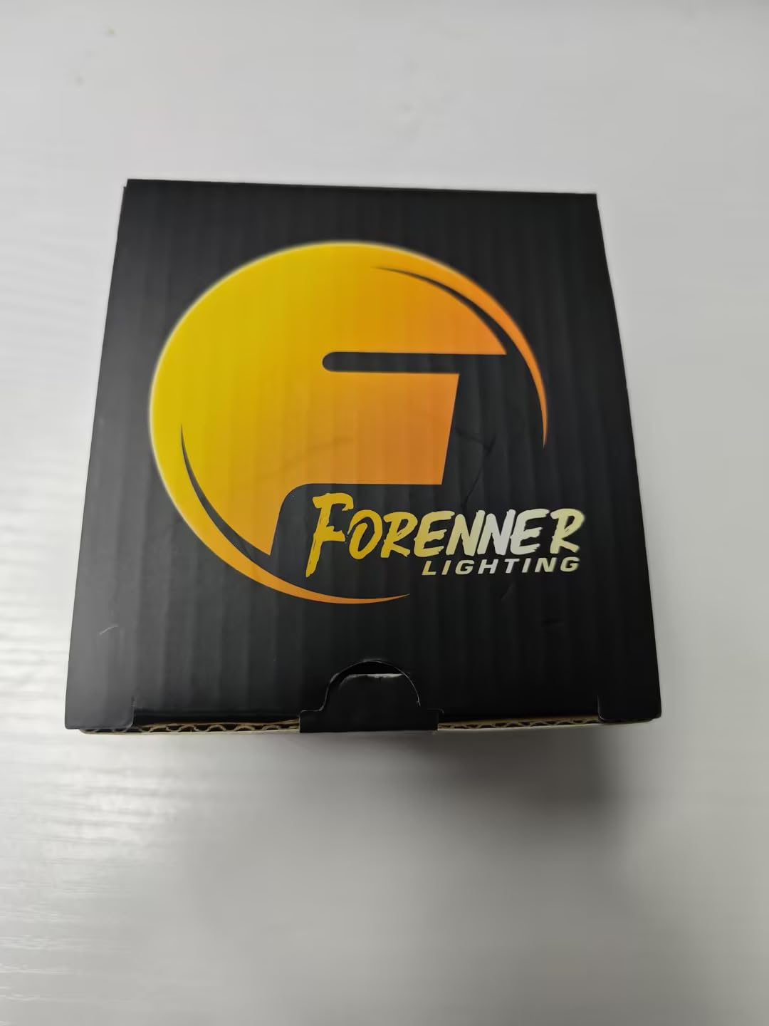 FORENNER next to halogen bulb for size comparison and easier swap