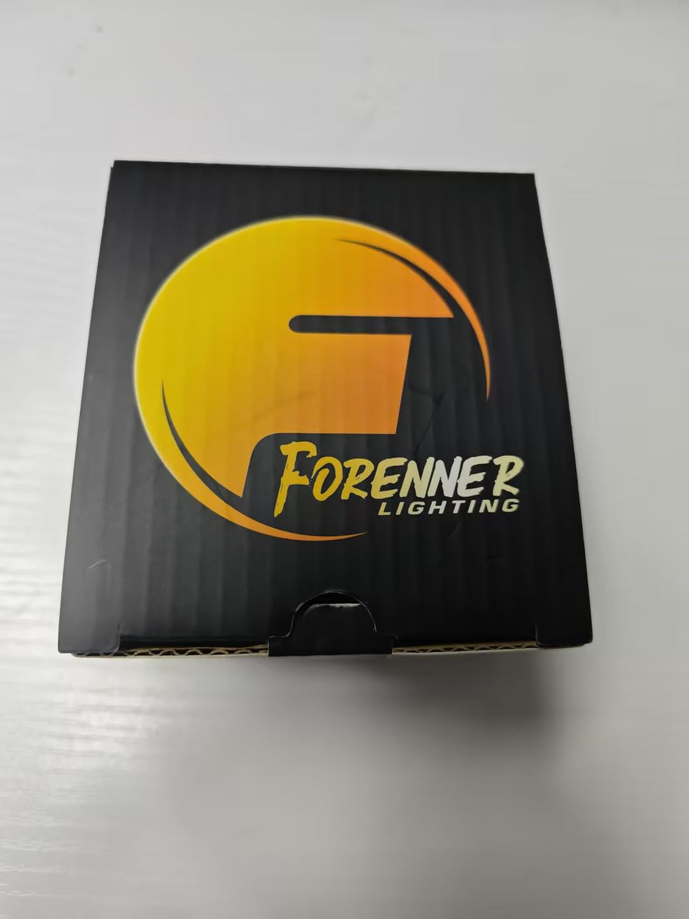 FORENNER next to halogen bulb for size comparison and easier swap