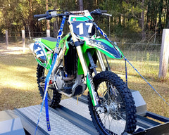 Fork-King in use on trailer stabilizing a dirt bike during transport