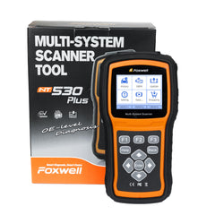 FOXWELL NT530 held in hand to show compact size and workshop portability