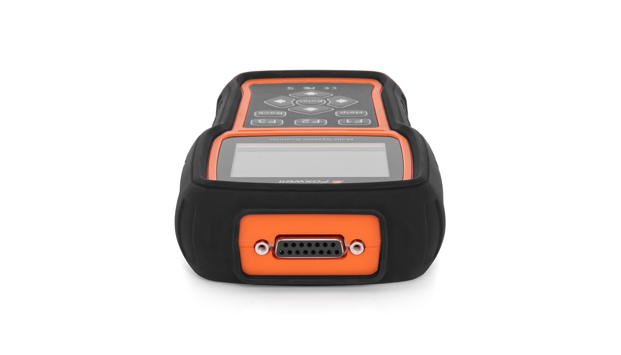 FOXWELL handheld next to hand for scale, compact and portable for technicians