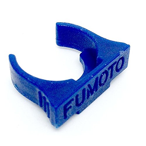 Fumoto F103SX draining oil into pan illustrating controlled pour