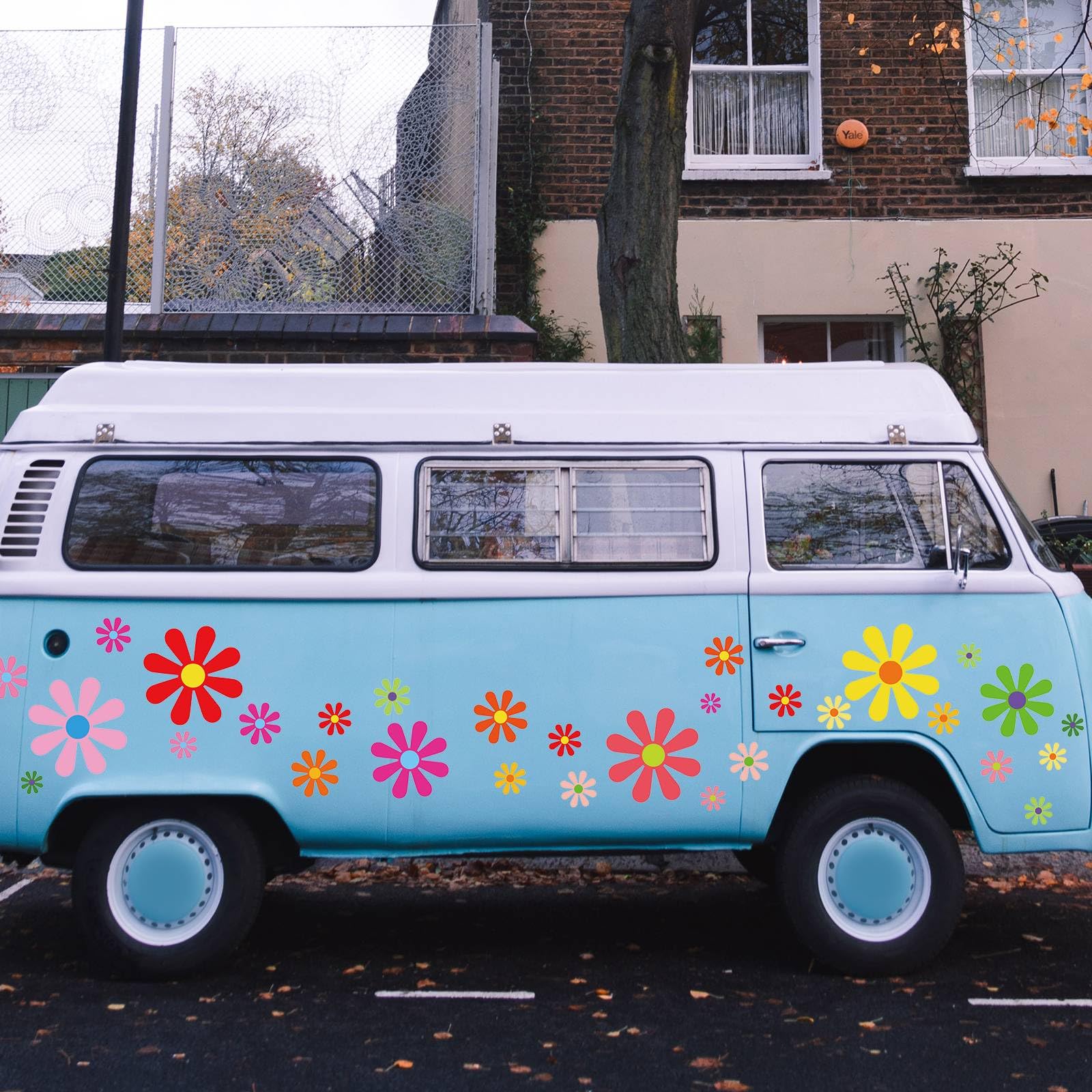 Fuutreo daisy decals applied to car bumper adding playful color