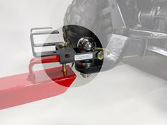 Garbage Commander haul pin engaged with wheeled garbage can demonstrating secure transport