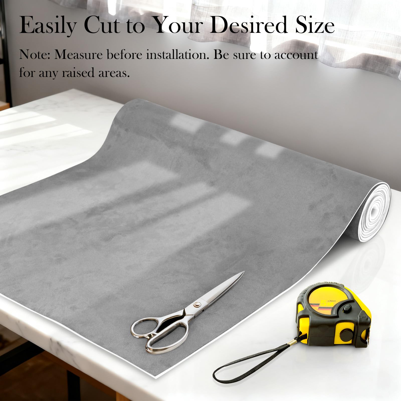 Garifon fabric being cut and measured for DIY installation offering easy customization