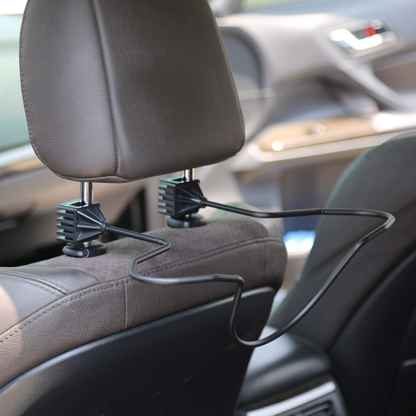 GEEDAR holding jacket and helmet to maximize seatback organization