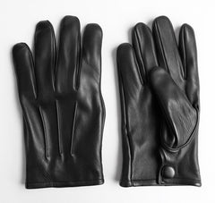 Generic gloves in use on steering wheel demonstrating enhanced grip and control benefit