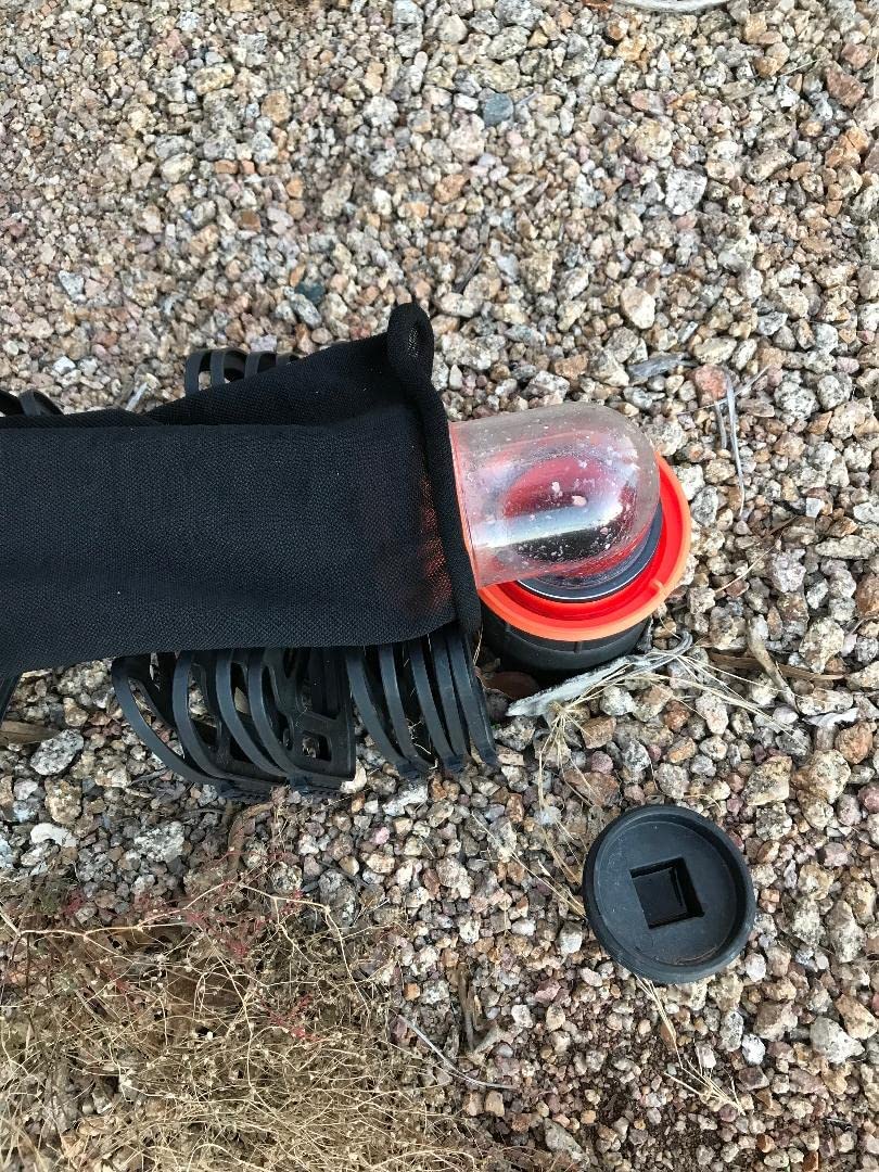 Generic installed on sewer hose showing covered couplings for cleaner hookups