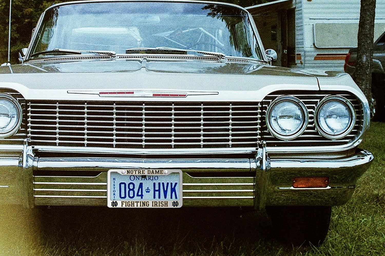 Generic Notre Dame frame installed on a car front and rear, provides polished team display