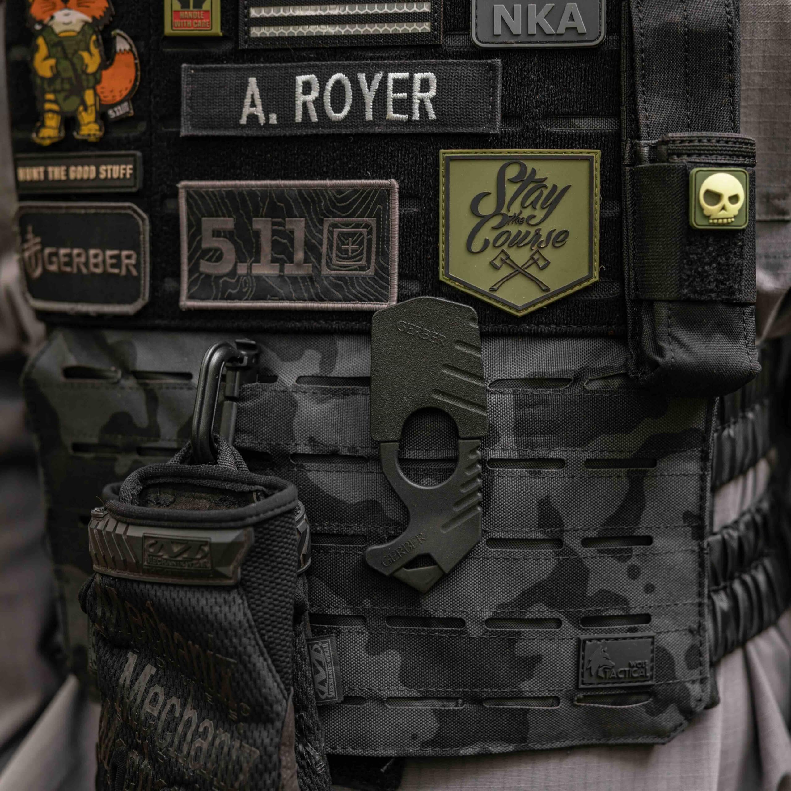 Gerber attached to MOLLE webbing illustrating organized carry advantage