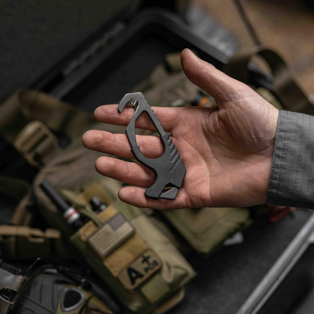 Gerber beside ruler for size comparison and convenient storage benefit