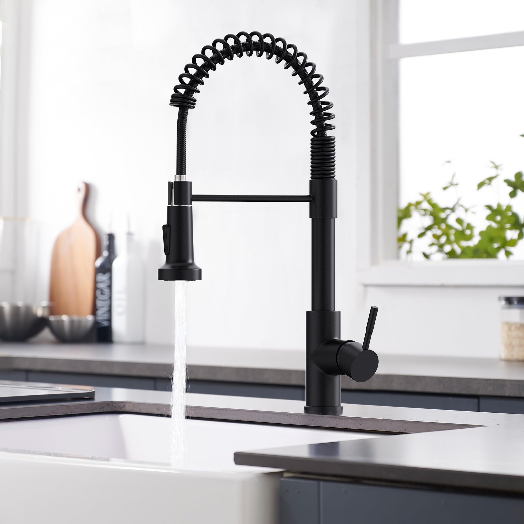 GIMILI faucet in use rinsing dishes showing powerful water pressure benefit: faster cleaning