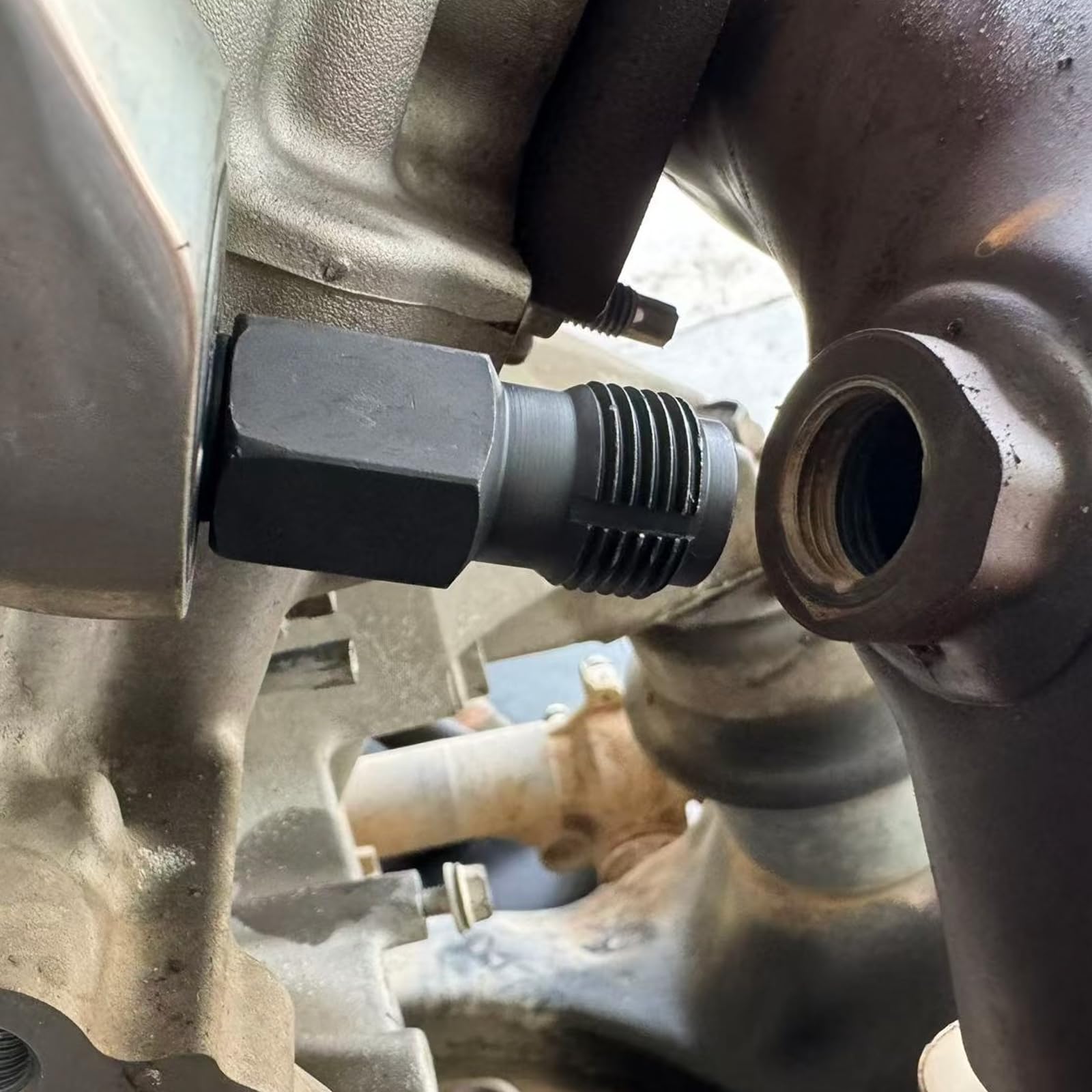 GIroiyai 22mm socket beside ruler showing proper size fit for most sensors
