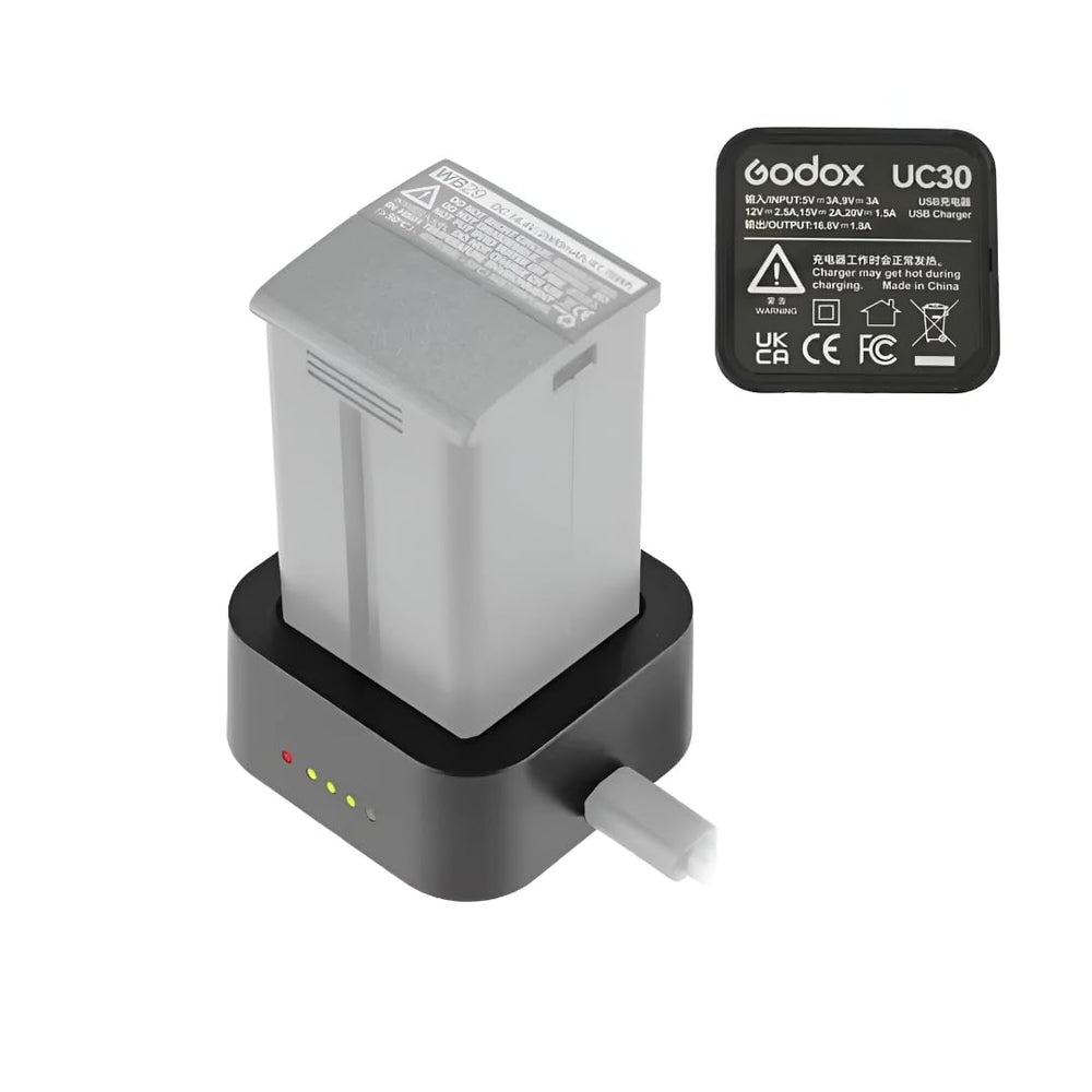 Godox UC30 charging a WB29 on location, portable power for faster shoots