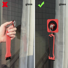 Gomake magnet holder in use on a car mirror securing vinyl giving installation control