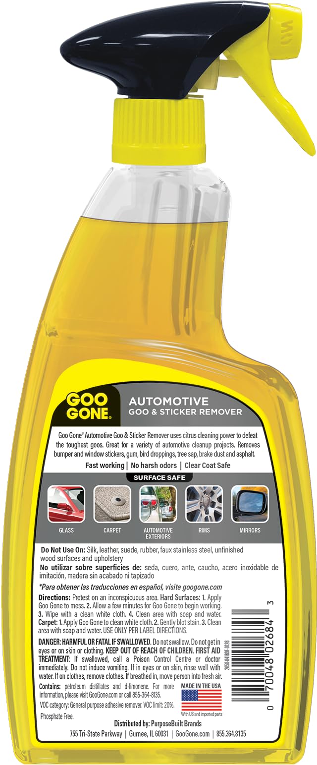 Goo Gone bottle in a garage setting ready for emergency cleanups