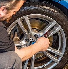 Griot's Garage bottle in use on a car wheel demonstrating safe, effective cleaning